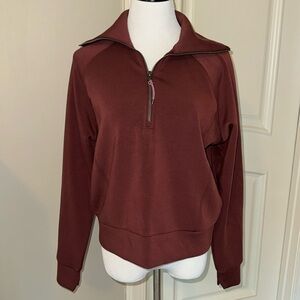 NWOT Spanx air essentials half zip. Color is Raisin. Size medium